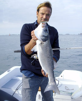 Ollivier Berry, Guide de pêche en mer à Saint-Malo, avec un lieu jaune